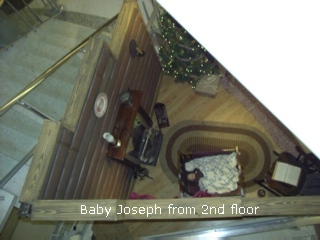 Baby Joseph Smith in crib 2nd floor view.