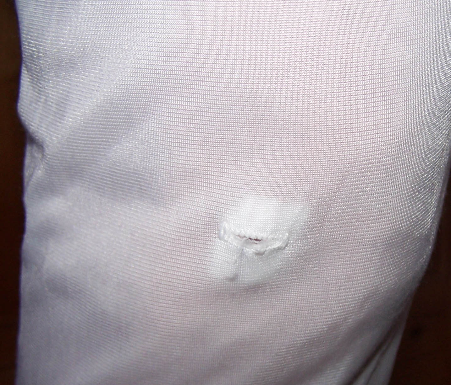 Mormon temple garment female knee marking.