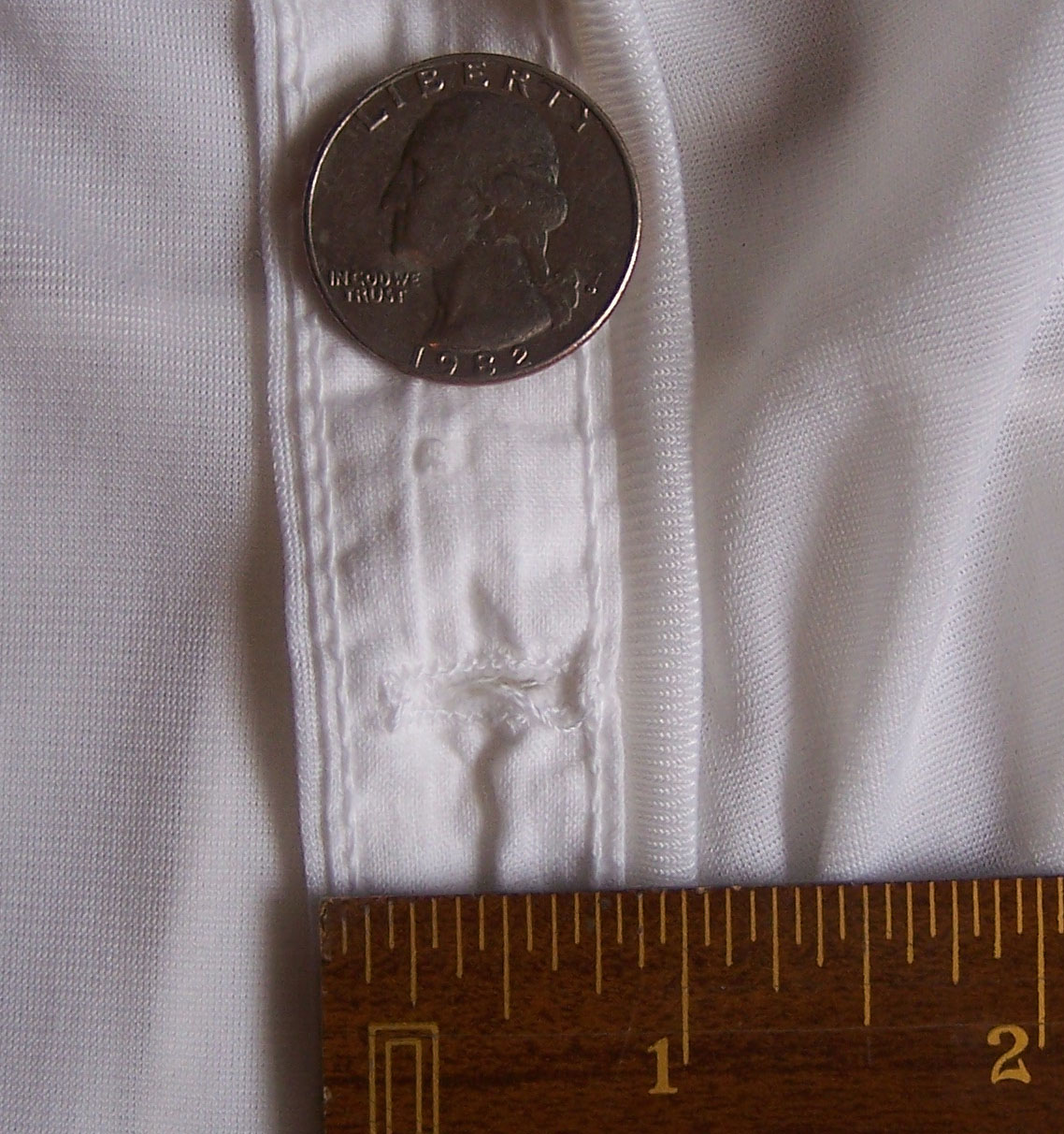 Mormon temple garment female navel marking inside stitching.