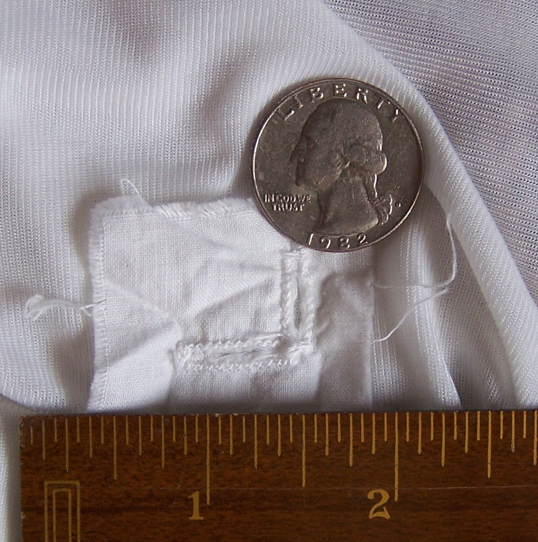 Mormon temple garment female square marking inside stitching.