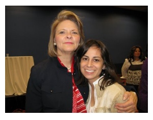 Sheri Dew giving reassuring hug.