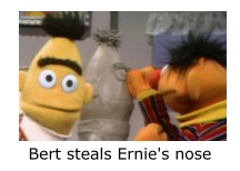 Burt steals Ernie's nose.