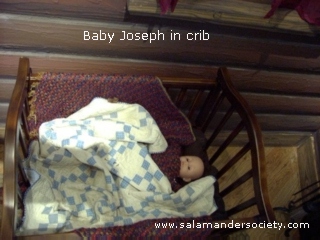 Baby Joseph Smith in crib first floor view.